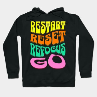 restart reset refocus go Hoodie